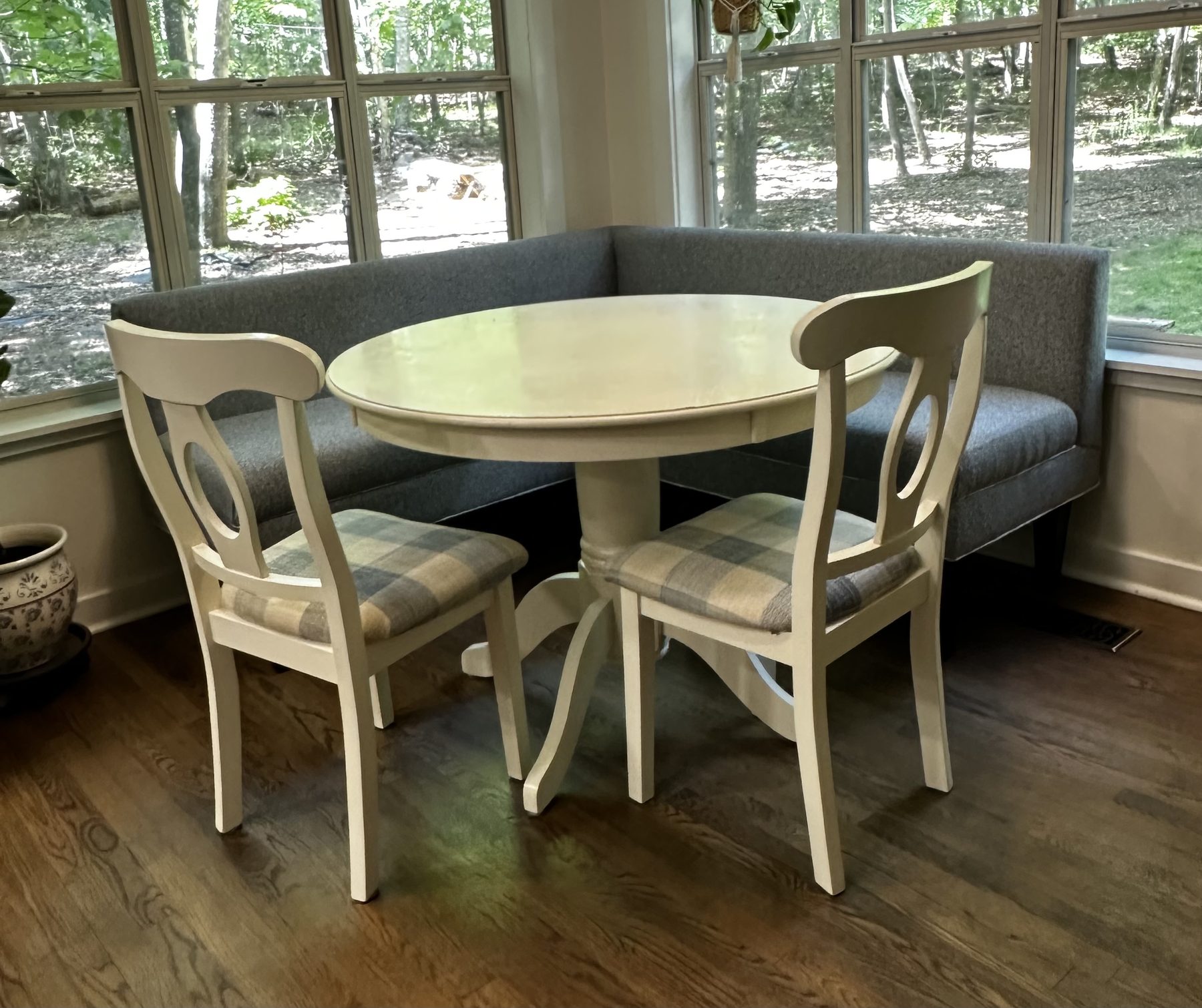 Custom corner banquette with table and chair cushions
